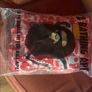 a brand new bape hoodie size medium